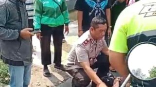 Respons Cepat Kapolsek Banjarmasin Selatan Bantu Korban Lakalantas di Jalan A Yani